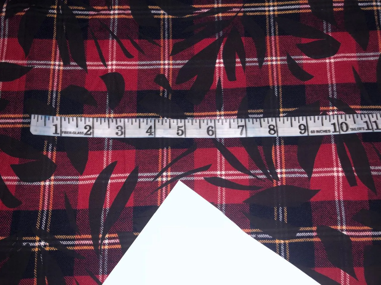 100% Cotton twill print Scottish tartan plaids with leaves available in 2 colors red, yellow, navy and white AND NAVY SELF